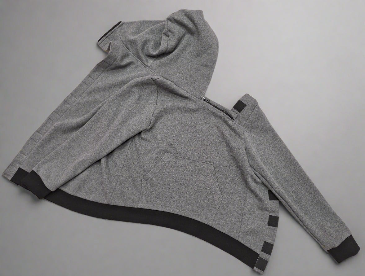 Adaptive hoodie made for quadriplegics lying flat on surface front view