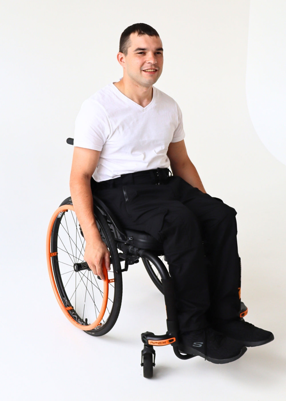 Men's cargo pants with side pockets, wheelchair adapted, black